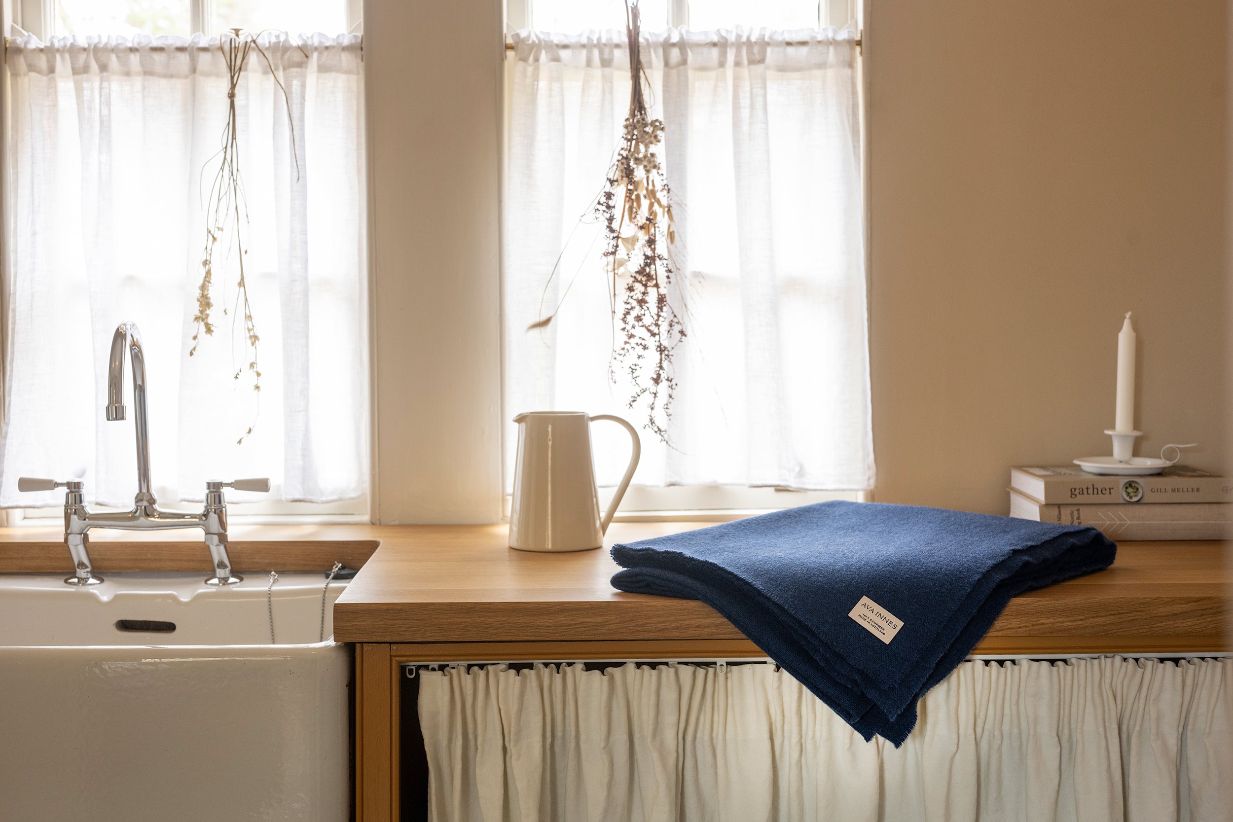 Luxury cashmere blanket on table top in the Kitchen at Tigh Na Coille