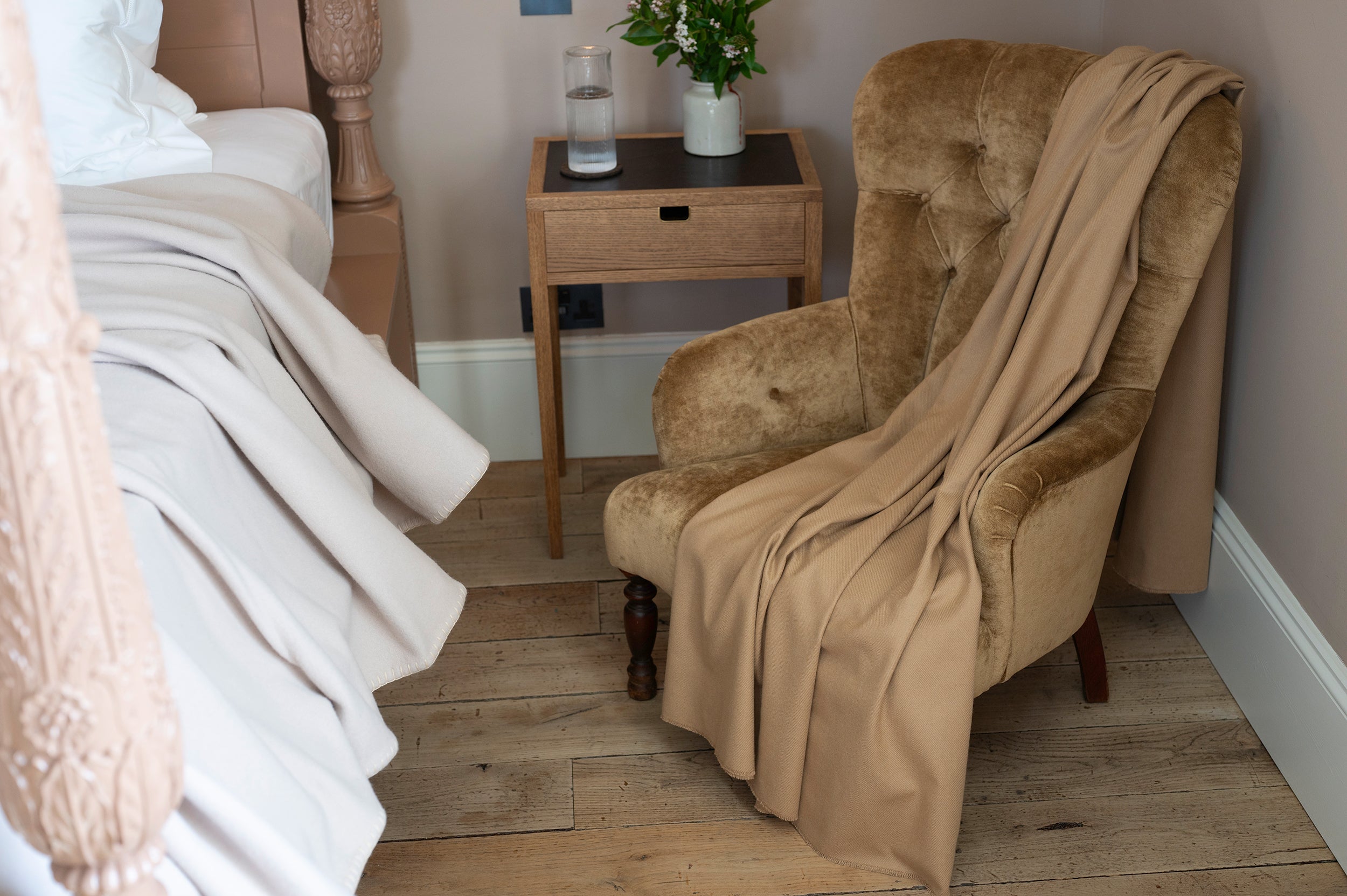 Luxury cashmere blanket on armchair in bedroom at Tigh Na Coille